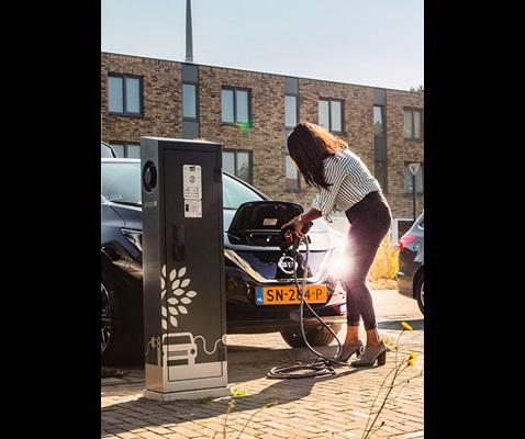 Woman charging a car